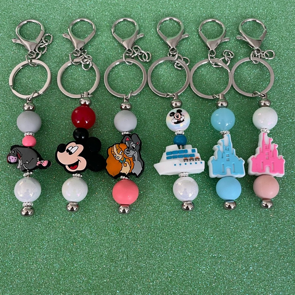 Disney themed keychain/Bag charms. Your choice. $10
